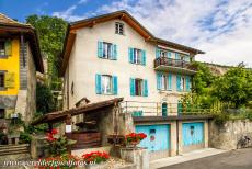 Wijngaardterrassen van de Lavaux - Wijngaardterrassen van Lavaux: Een wijnpers bij een huis. Door het goed bewaard gebleven landschap en de architectuur laat de...