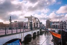 Canal Ring Area of Amsterdam - Seventeenth-century Canal Ring Area of Amsterdam inside the Singelgracht: The Magere Brug (Skinny Bridge) is one of the most famous bridges of... Canal Ring Area of Amsterdam - Seventeenth-century Canal Ring Area of Amsterdam inside the Singelgracht: The Magere Brug (Skinny Bridge) is one of the most famous bridges of...