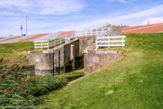 Dutch part of the Wadden Sea - Wadden Sea: An old sluice gate in the Ommelander Sea Dike at the hamlet of Noordpolderzijl. Along the shallow Wadden Sea, the... Dutch part of the Wadden Sea - Wadden Sea: An old sluice gate in the Ommelander Sea Dike at the hamlet of Noordpolderzijl. Along the shallow Wadden Sea, the...