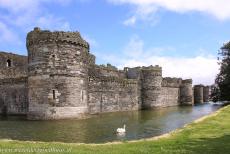 Beaumaris Castle - Castles and Town Walls of King Edward in Gwynedd: The outer wall and the moat of Beaumaris Castle. Four lines of massive fortifications... Beaumaris Castle - Castles and Town Walls of King Edward in Gwynedd: The outer wall and the moat of Beaumaris Castle. Four lines of massive fortifications...