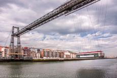 Vizcaya Bridge - The Vizcaya Bridge and its gondola hovering above the river Nervión. The Vizcaya Bridge spans the mouth of the river Nervión. The... Vizcaya Bridge - The Vizcaya Bridge and its gondola hovering above the river Nervión. The Vizcaya Bridge spans the mouth of the river Nervión. The...