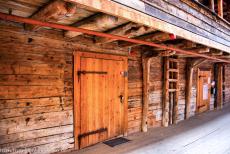 Bryggen - A view down one of the the narrow alleys of Bryggen, the houses were combined living quarters and warehouses. The gable porch provided shelter... Bryggen - A view down one of the the narrow alleys of Bryggen, the houses were combined living quarters and warehouses. The gable porch provided shelter...