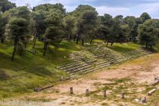 Sanctuary of Asklepios at Epidaurus - The stadium at the Sanctuary of Asklepios at Epidaurus. The ancient sanctuary is situated on the Peloponnese, a large peninsula... Sanctuary of Asklepios at Epidaurus - The stadium at the Sanctuary of Asklepios at Epidaurus. The ancient sanctuary is situated on the Peloponnese, a large peninsula...