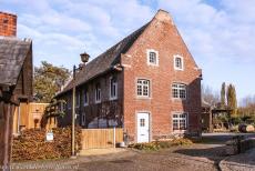 Flemish Béguinage Sint Truiden - A brick house in the former Flemish Béguinage of Sint Truiden. Women who lived in a béguinage supported themselves with... Flemish Béguinage Sint Truiden - A brick house in the former Flemish Béguinage of Sint Truiden. Women who lived in a béguinage supported themselves with...