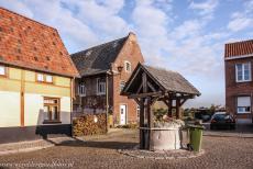 Flemish Béguinage Sint Truiden - Flemish Béguinages: The former water well in the Flemish Béguinage of Sint Truiden, the water well is now used as a flower... Flemish Béguinage Sint Truiden - Flemish Béguinages: The former water well in the Flemish Béguinage of Sint Truiden, the water well is now used as a flower...
