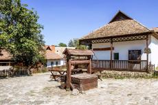 Old Village of Hollókő - The Old Village of Hollókő and its Surroundings: The wooden water well of the village. The small village of Hollókő is... Old Village of Hollókő - The Old Village of Hollókő and its Surroundings: The wooden water well of the village. The small village of Hollókő is...