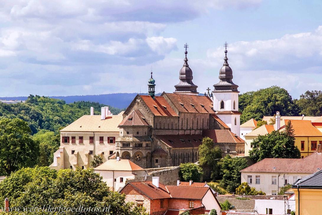 Jewish Quarter and St Procopius Basilica, Třebíč - The St. Procopius' Basilica in Třebíč, in front a few houses of the Jewish Quarter. Třebíč is a town in the Moravian part of the... Jewish Quarter and St Procopius Basilica, Třebíč - The St. Procopius' Basilica in Třebíč, in front a few houses of the Jewish Quarter. Třebíč is a town in the Moravian part of the...