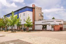 Berlin Modernism Housing Estates - Berlin Modernism Housing Estates: A number of shops and a restaurant in the Hufeisensiedlung (Horseshoe Estate) in... Berlin Modernism Housing Estates - Berlin Modernism Housing Estates: A number of shops and a restaurant in the Hufeisensiedlung (Horseshoe Estate) in...