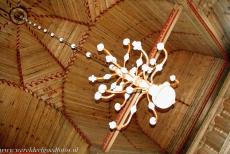 Petäjävesi Old Church - Petäjävesi Old Church: The wooden chandelier in the central section of the dome is crafted in the Baroque style, which was popular at... Petäjävesi Old Church - Petäjävesi Old Church: The wooden chandelier in the central section of the dome is crafted in the Baroque style, which was popular at...